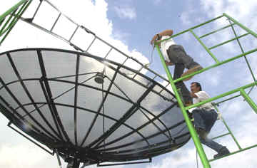 Setting up a 10-Foot Satellite Dish for DVB reception for the French News Agency.  Technical missions for foreign national news agencies, and embassies within the Asia-Pacific region has been 18-years living within the tangle of networks, satellite communications, multi-point data broadcasting and reception, feeding global events to media institutions the world over